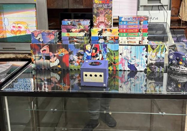 VGU store display case with GameCube and Dragon Ball collection